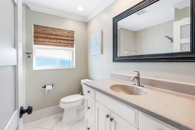 bathroom with toilet, tile patterned flooring, crown molding, and vanity