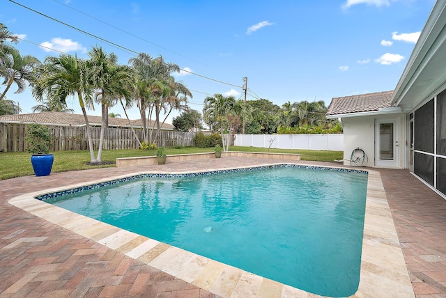 view of swimming pool featuring a patio area