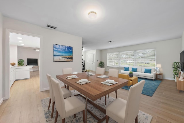 dining area featuring light hardwood / wood-style flooring