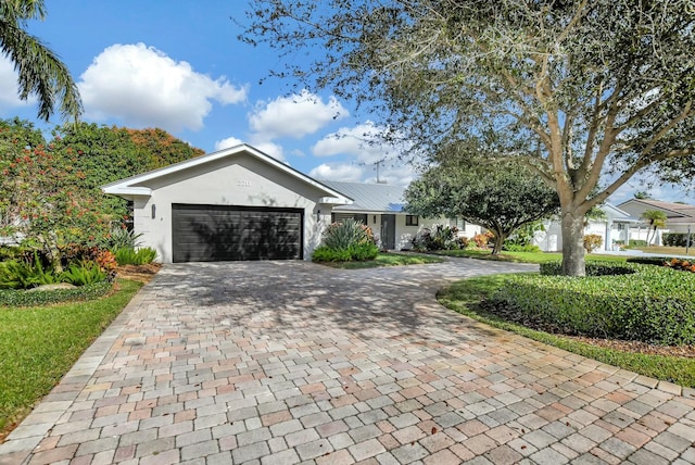 ranch-style house with a garage