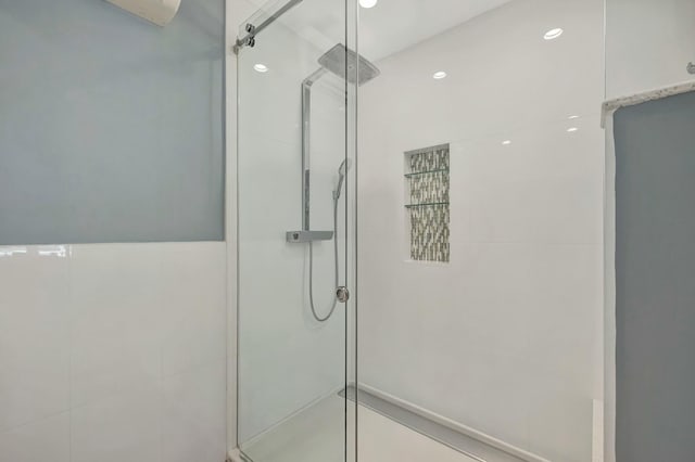 bathroom featuring an enclosed shower