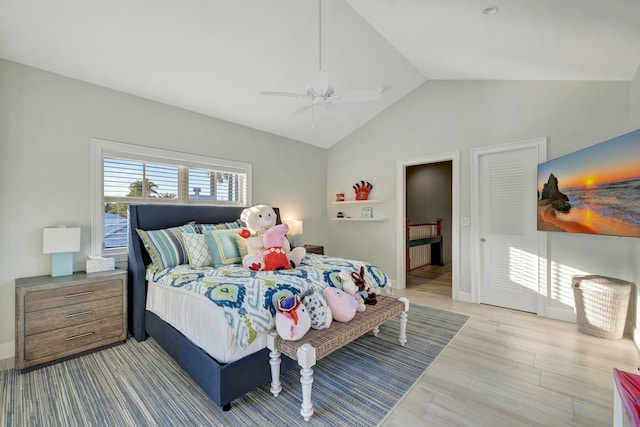 bedroom featuring vaulted ceiling, ceiling fan, and wood-type flooring