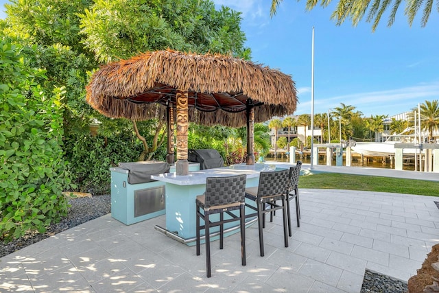 view of patio with an outdoor bar