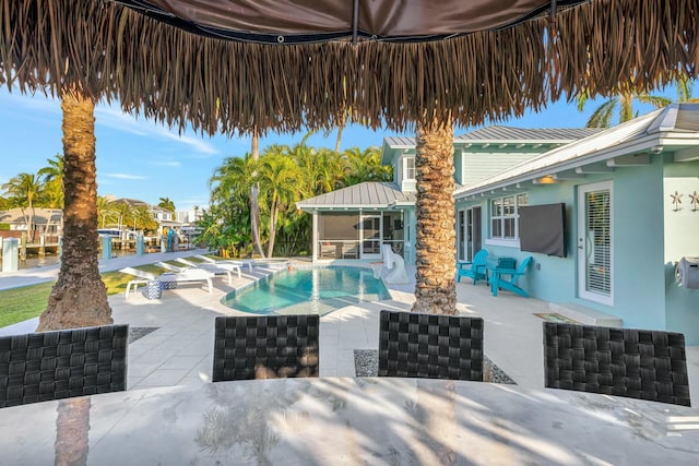 view of pool with a patio area