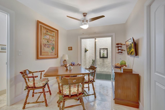 dining area with ceiling fan