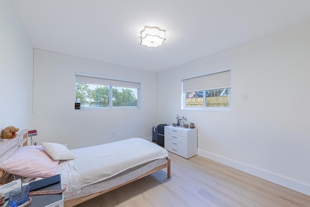 bedroom featuring light hardwood / wood-style flooring