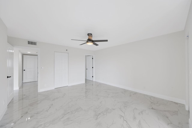 spare room featuring ceiling fan