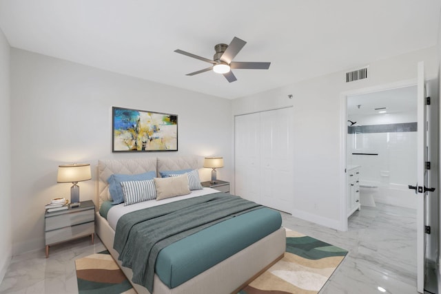 bedroom featuring baseboards, marble finish floor, visible vents, and a closet
