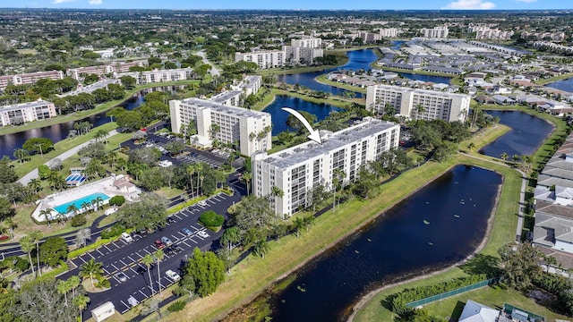 birds eye view of property featuring a water view