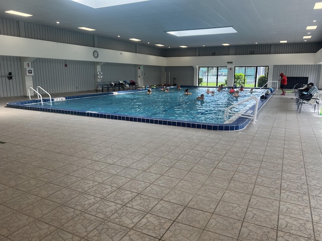 view of pool with a skylight