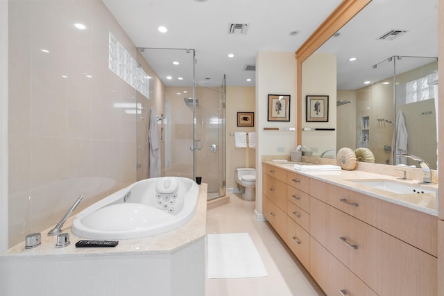 full bathroom with toilet, vanity, tile patterned floors, and plus walk in shower