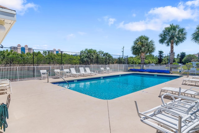 view of swimming pool featuring a patio