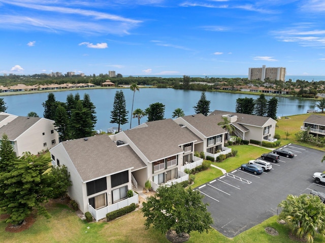 birds eye view of property featuring a water view