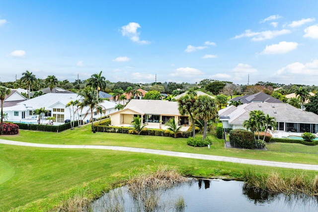 birds eye view of property featuring a water view