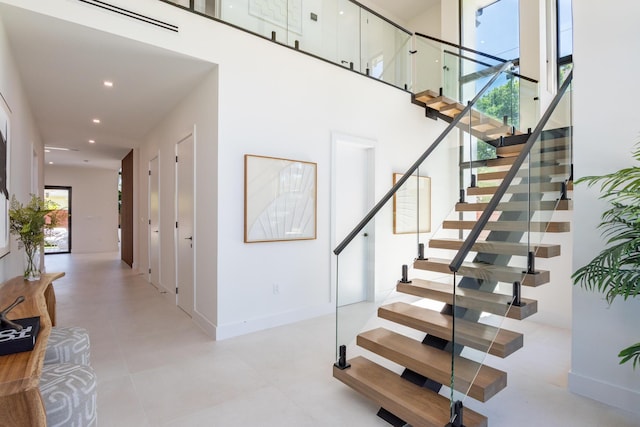 stairway with a high ceiling