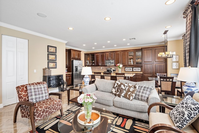 living room with light tile patterned floors and ornamental molding