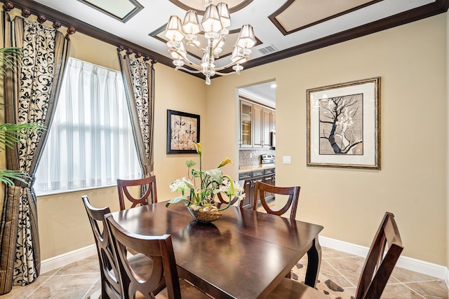 tiled dining space featuring an inviting chandelier and ornamental molding