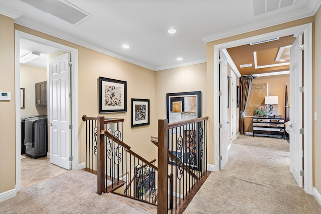 hall with light colored carpet and crown molding