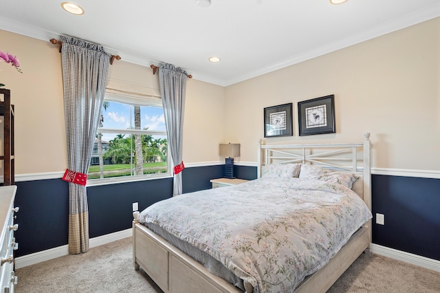 carpeted bedroom with ornamental molding