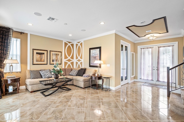 living room with crown molding and french doors