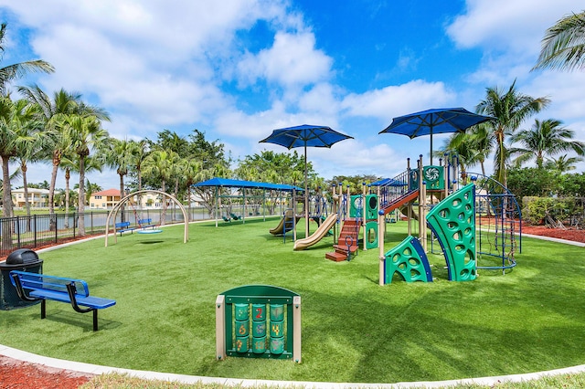 view of jungle gym with a lawn