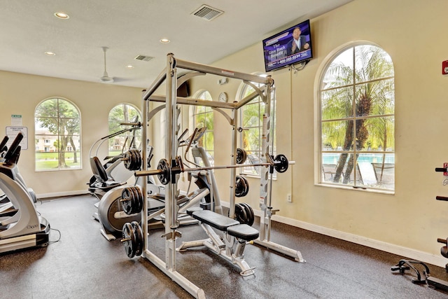 workout area with ceiling fan