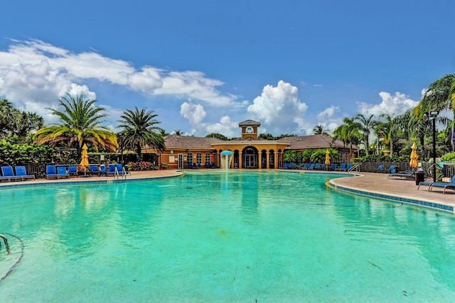 view of swimming pool with a patio