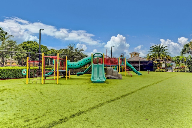 view of jungle gym with a yard