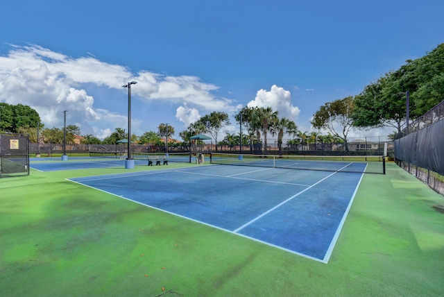 view of tennis court with basketball court