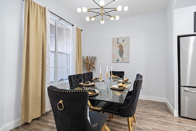 dining space featuring hardwood / wood-style flooring