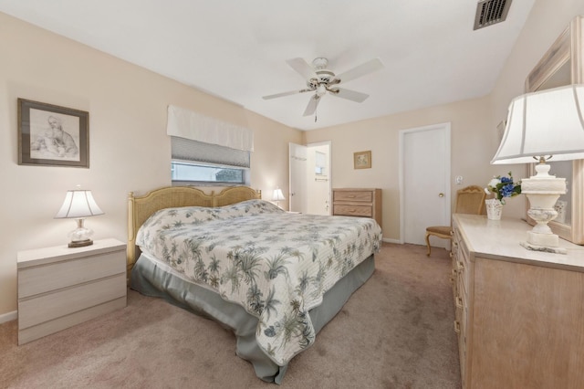 bedroom featuring ceiling fan and light carpet