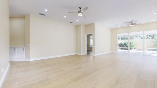 unfurnished room with ceiling fan and light hardwood / wood-style flooring