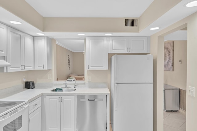 kitchen featuring white appliances, extractor fan, white cabinetry, sink, and light tile patterned floors