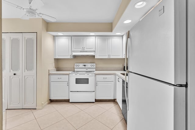 kitchen featuring ceiling fan, light tile patterned floors, white cabinets, and white appliances