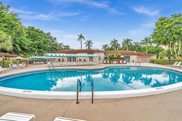 view of pool featuring a patio area