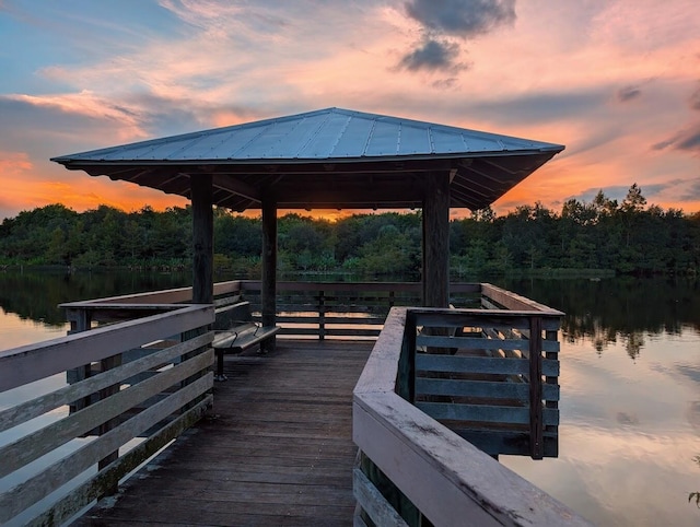 dock area with a gazebo and a water view