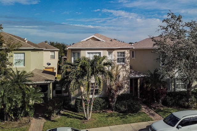 view of front of home featuring a front yard