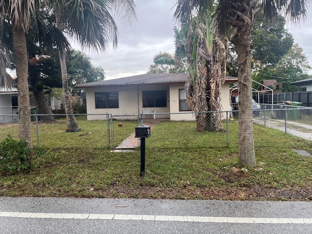 view of front of home with a front yard