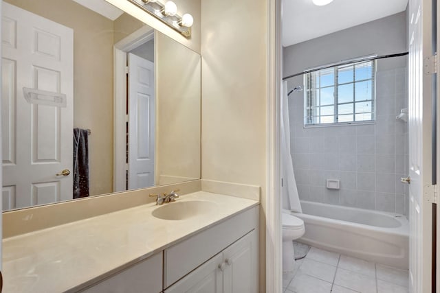 full bathroom featuring shower / bath combination with curtain, toilet, vanity, and tile patterned flooring