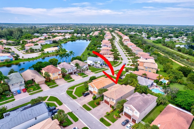 bird's eye view with a water view