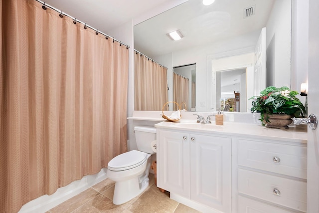 full bathroom featuring vanity, shower / bath combo with shower curtain, and toilet