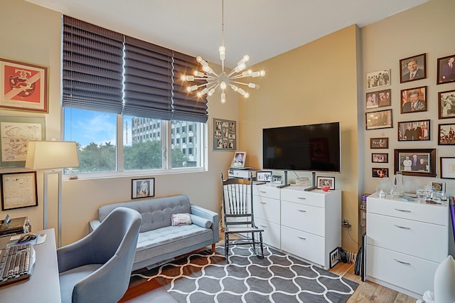 office featuring a notable chandelier and light wood-type flooring