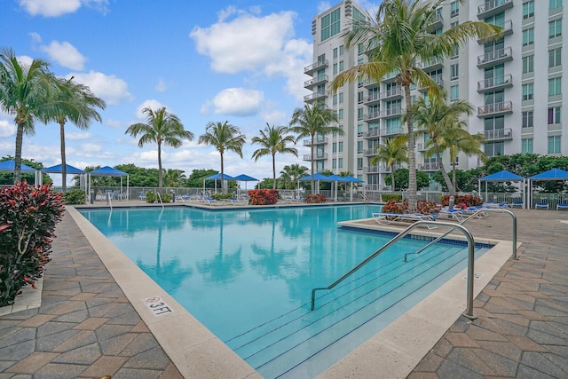 view of pool featuring a gazebo and a patio