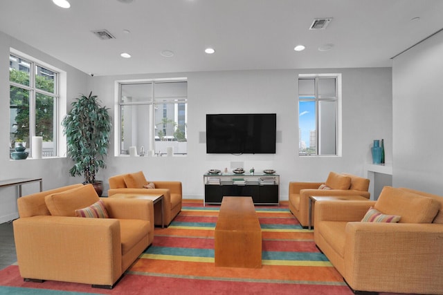 living room featuring plenty of natural light