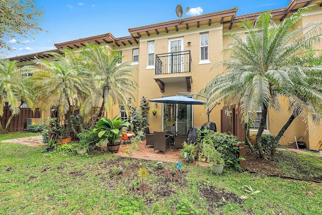 rear view of house with a patio area