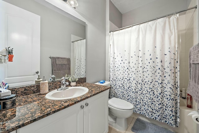 full bathroom with toilet, vanity, shower / bath combo, and tile patterned floors