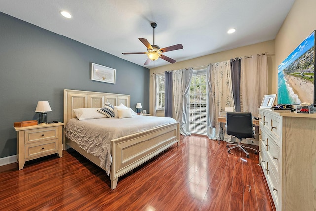 bedroom featuring ceiling fan, dark hardwood / wood-style flooring, and access to exterior