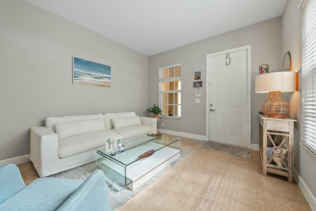 living room with light tile patterned floors