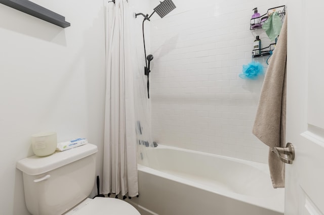 bathroom featuring toilet and shower / bath combo