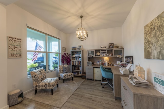 office area featuring hardwood / wood-style flooring and a chandelier